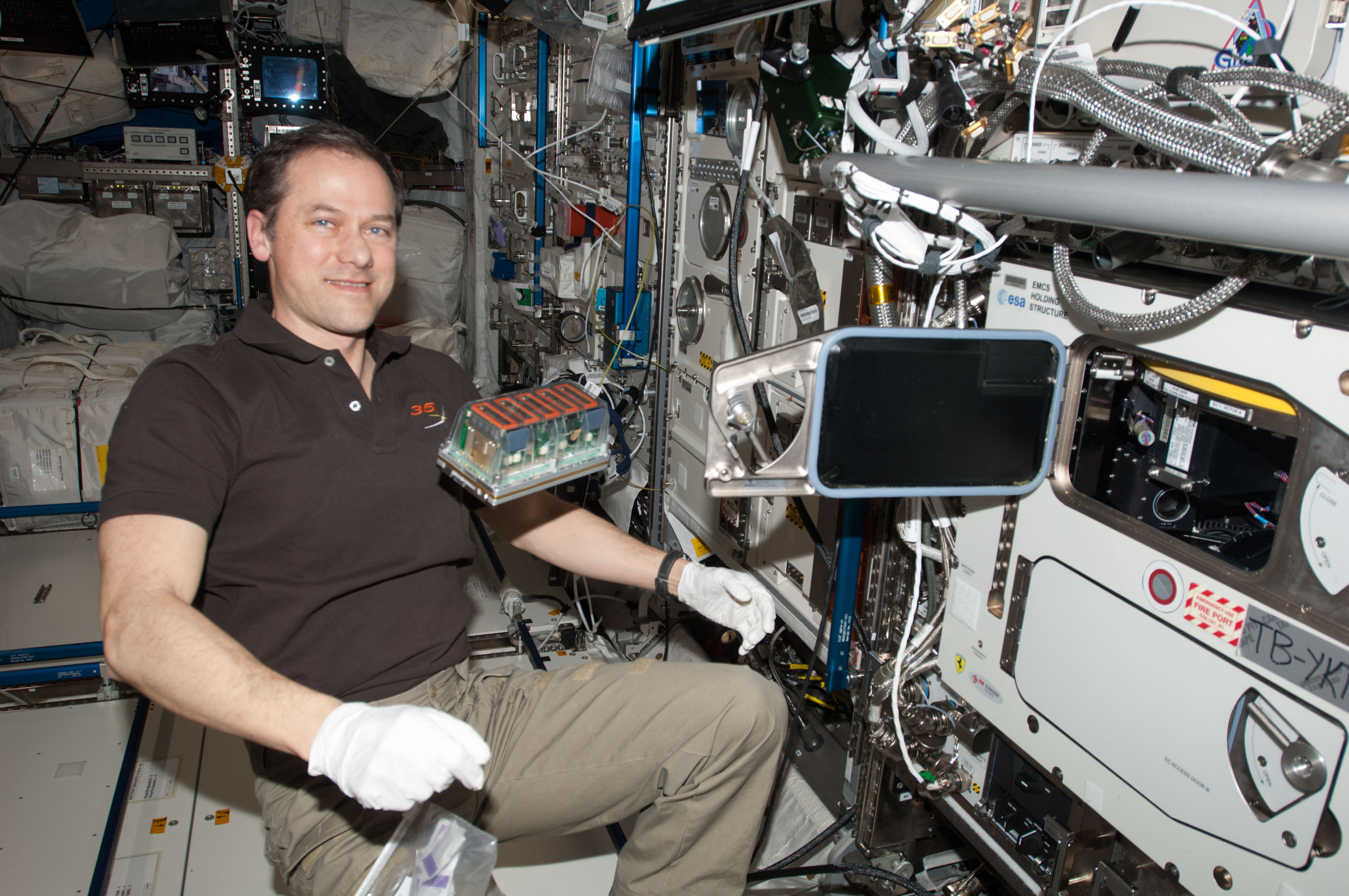 Tom Mashburn at ISS with Seedling Growth (credit: NASA)